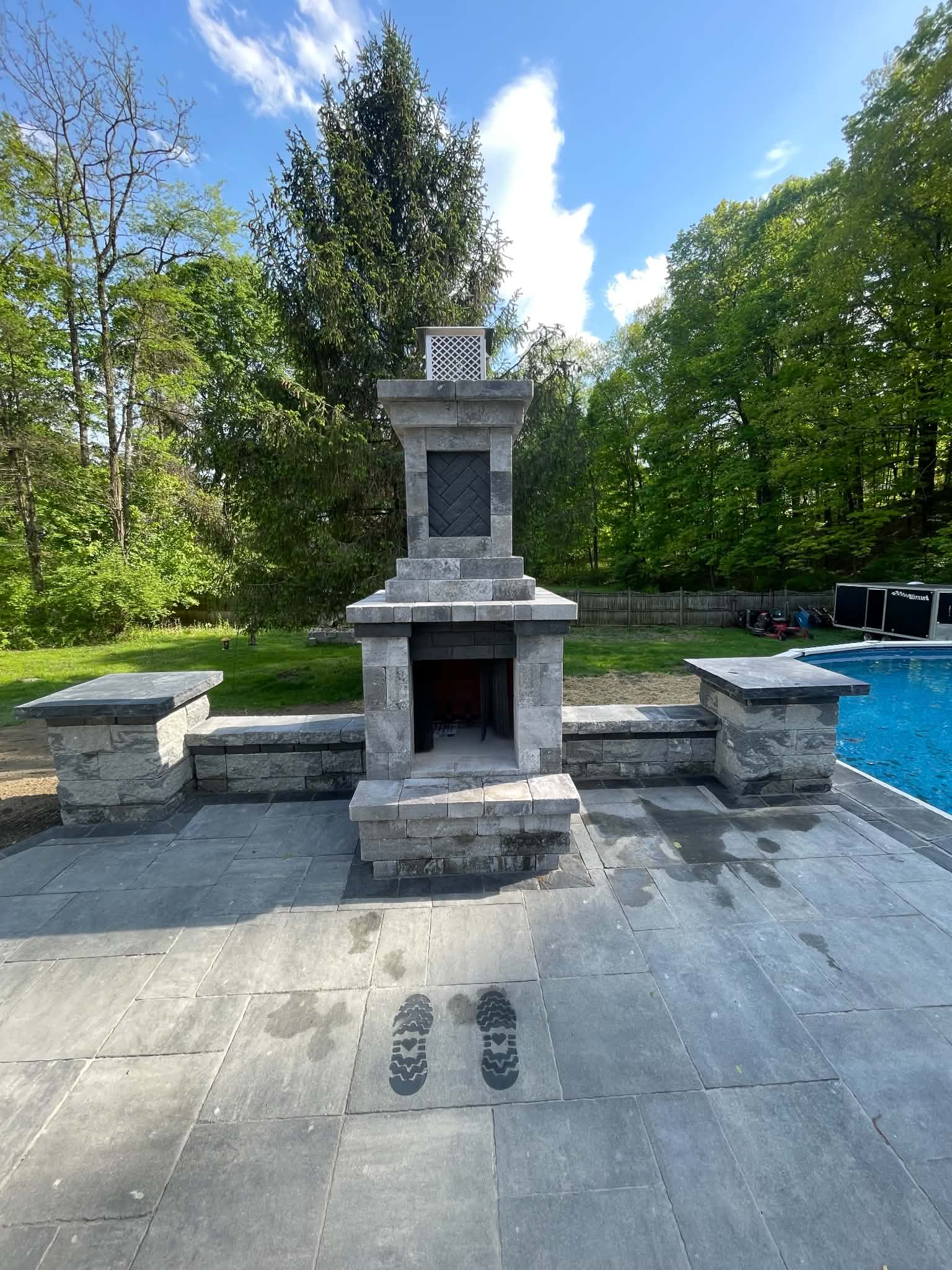 Decorative concrete engraving on outdoor hardscape — BG Impressions